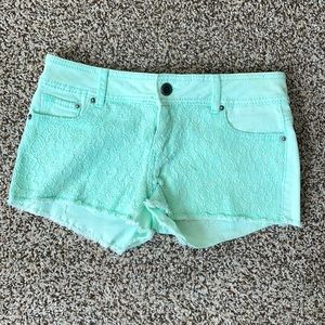 Teal jean shorts